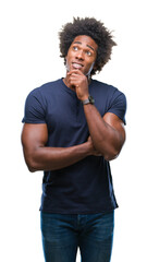 Wall Mural - afro american man over isolated background with hand on chin thinking about question, pensive expres