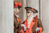 Fototapeta Big Ben - Colorful carnival masks at a traditional festival in Venice, Italy