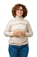 Wall Mural - Beautiful middle ager senior woman wearing turtleneck sweater and glasses over isolated background Hands together and fingers crossed smiling relaxed and cheerful. Success and optimistic