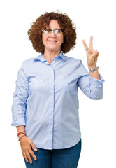 Sticker - Beautiful middle ager senior businees woman wearing glasses over isolated background showing and pointing up with fingers number two while smiling confident and happy.