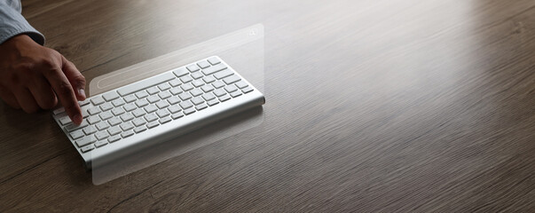 Fototapete - man searching information is typing a keyboard technology search engine optimization on desk in offi