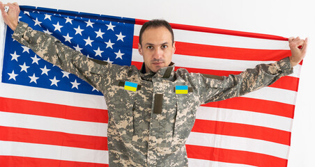 Wall Mural - Ukrainian military man with USA flag