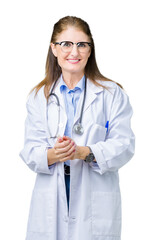 Sticker - Middle age mature doctor woman wearing medical coat over isolated background Hands together and fingers crossed smiling relaxed and cheerful. Success and optimistic