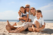 © New Africa - Cute little children with grandparents spending time together on sea beach