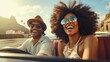 A cheerful African-American couple in glasses on a convertible travels the world