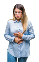 Poster - Young beautiful business woman wearing glasses over isolated background with hand on stomach because indigestion, painful illness feeling unwell. Ache concept.