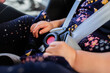 © Austockphoto - Buckle and straps done up with toddler in extended rear facing car seat