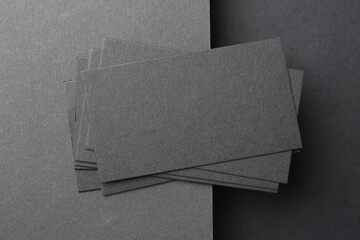 Sticker - Blank business cards on black background, top view. Mockup for design