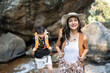 © itchaznong - Happy LGBT Lesbian couple Travelers Hiking with Backpacks in waterfall Trail. LGBT Lesbian Couple Hikers with backpacks walks in mountains in vacation