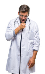 Wall Mural - Young handsome doctor man over isolated background feeling unwell and coughing as symptom for cold or bronchitis. Healthcare concept.