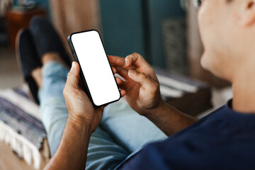 Wall Mural - cell phone blank white screen mockup.hand holding texting using mobile on desk at office.background empty space for advertise.work people contact marketing business,technology