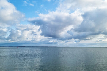 Wall Mural - Picturesque views of the clouds and the sea. Outdoor recreation.