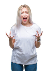 Canvas Print - Young blonde woman over isolated background crazy and mad shouting and yelling with aggressive expression and arms raised. Frustration concept.