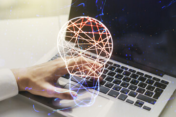 Poster - Creative light bulb illustration with hands typing on computer keyboard on background, future technology concept. Multiexposure