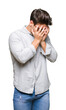 © Krakenimages.com - Young handsome man wearing glasses over isolated background with sad expression covering face with hands while crying. Depression concept.