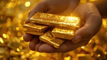 Hands Holding Shiny Gold Bars Close Up    