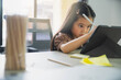 © Sirichai - Little girl doing online homework with tablet at home. Happy girl doing online homework at home. Study online concept.