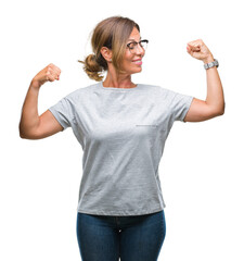 Sticker - Middle age senior hispanic woman wearing glasses over isolated background showing arms muscles smiling proud. Fitness concept.