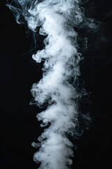 Poster - White smoke billowing against a black background. Versatile image for various creative projects