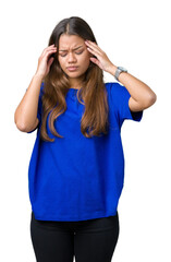 Poster - Young beautiful brunette woman wearing blue t-shirt over isolated background covering ears with fingers with annoyed expression for the noise of loud music. Deaf concept.