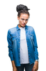 Poster - Young braided hair african american girl wearing glasses over isolated background with serious expression on face. Simple and natural looking at the camera.