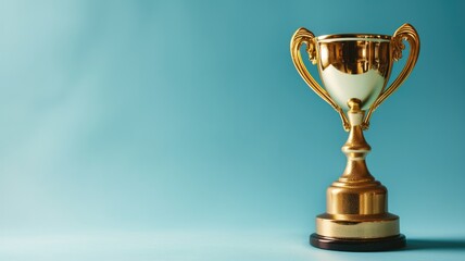 Wall Mural - Golden trophy on a teal blue background