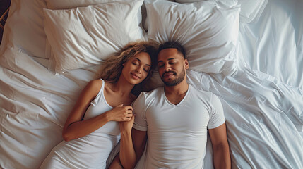 Top view beautiful young couple two family in casual white clothes lying in bed sleep woman hands folded under head on man shoulder relax spend time together in bedroom lounge home in own room house