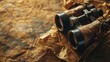 Vintage binoculars on crumpled brown paper, evoking historical exploration themes