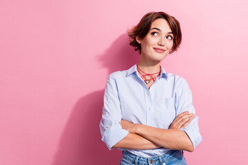 Sticker - Photo of gorgeous creative minded lady folded hands look empty space contemplate isolated on pink color background