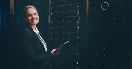 Fototapete - Portrait of happy woman in data center with tablet, inspection or network maintenance with engineer with update. Tech service, system administration or technician on digital app checking server room.