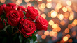 Ramo de rosas rojas con luces bokeh en el fondo