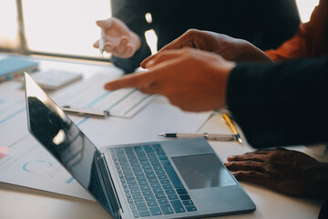 Co working conference, Business team meeting present, investor colleagues discussing new plan financial graph data on office table with laptop and digital tablet, Finance, accounting, investment.