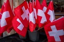 Swiss Flag. Group Of Switzerland Flag. Red Square Flag With A White Cross In The Centre.