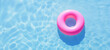 Summer Vibes: Pink Float in Sunlit Pool