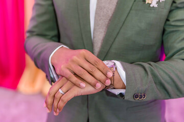 Canvas Print - Groom's official wedding outfit watch close up
