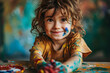 © Kenishirotie - Little happy girl with painted t-shirt and hand prints close up.