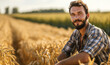 © ink drop - Portrait of a young farmer in a wheat field at sunset