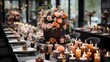 A stylish and modern birthday party setup with a sleek black and gold color scheme. The table is filled with elegant floral arrangements, candles, and a stunning birthday cake as the centerpiece
