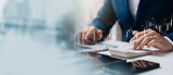 Businessman use laptop and tablet analyzing company growth, future business growth arrow graph, development to achieve goals, business outlook, financial data for long term investment.