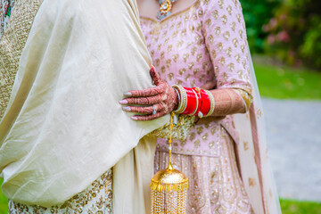 Indian couple's holding hands close up