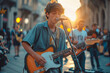 © Alexey Kuznetsov - Street concert of a teenage guy with a guitar on a city street in the rays of the setting sun