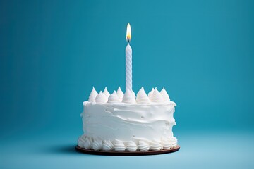 Poster - White cake with lit candle on blue background