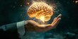 Human hands holding a brain