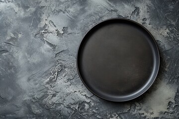 Wall Mural - black plate against a backdrop