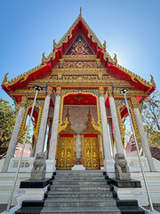 Wall Mural - Picture of a Buddhist church The gold color is beautiful and dazzling to the eye.