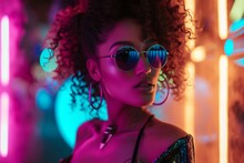Fashionable Young Woman With Curly Hair Wearing Sunglasses At Night, Neon Lights Background.