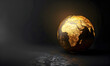 Globe in the form of a golden ball on the dark background. Decorative element.