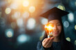 Education, e-learning graduate certificate and business concept, Women showing light bulb with graduation hat in hand Education technology study knowledge, human creative thinking idea