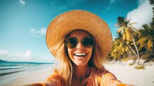Happy Young Woman In Straw Hat And Sunglasses Takes A Selfie On The Beach Against The Backdrop Of Palm Trees