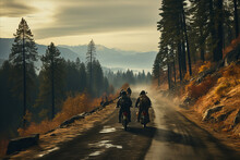 Motorcyclists Riding On A Paved Road In The Mountains Amidst The Forest With Cloudy Sky
